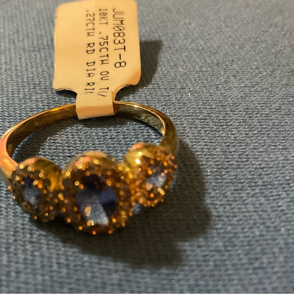Ring 10KT, .25ctw diamond with Tanzanite .50ctw size 8